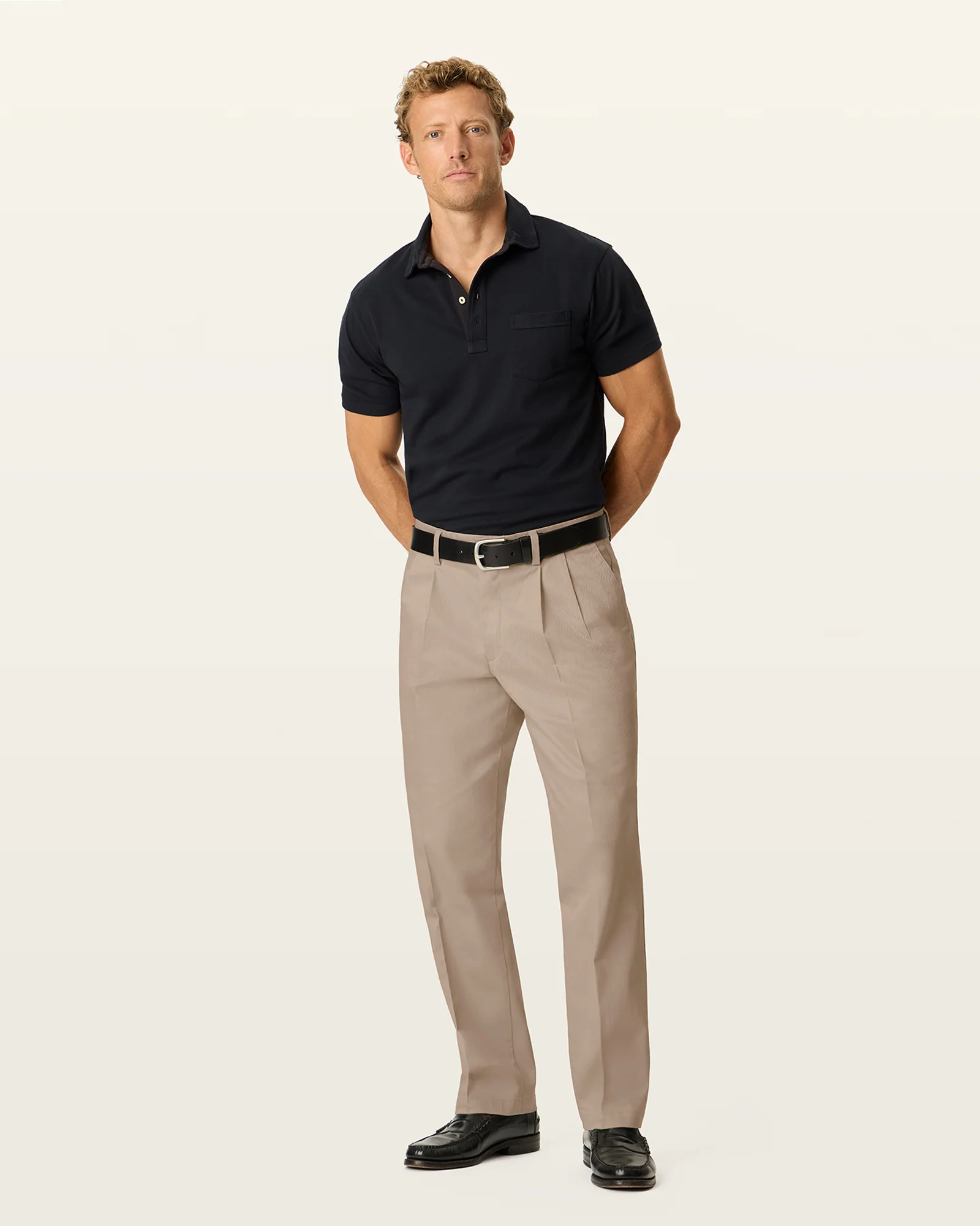 Signature Khakis. Pleated. Classic Fit