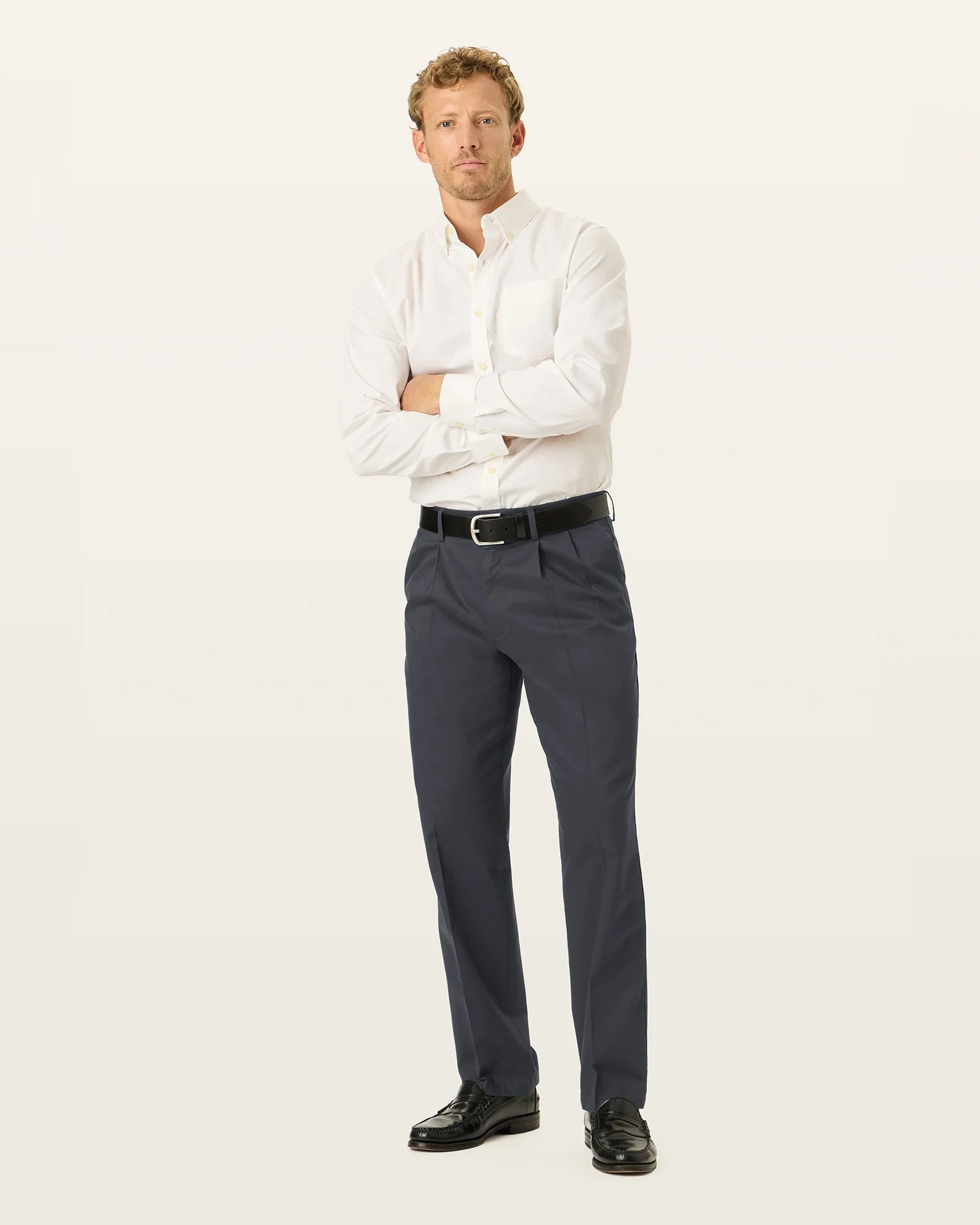 Signature Khakis. Pleated. Classic Fit