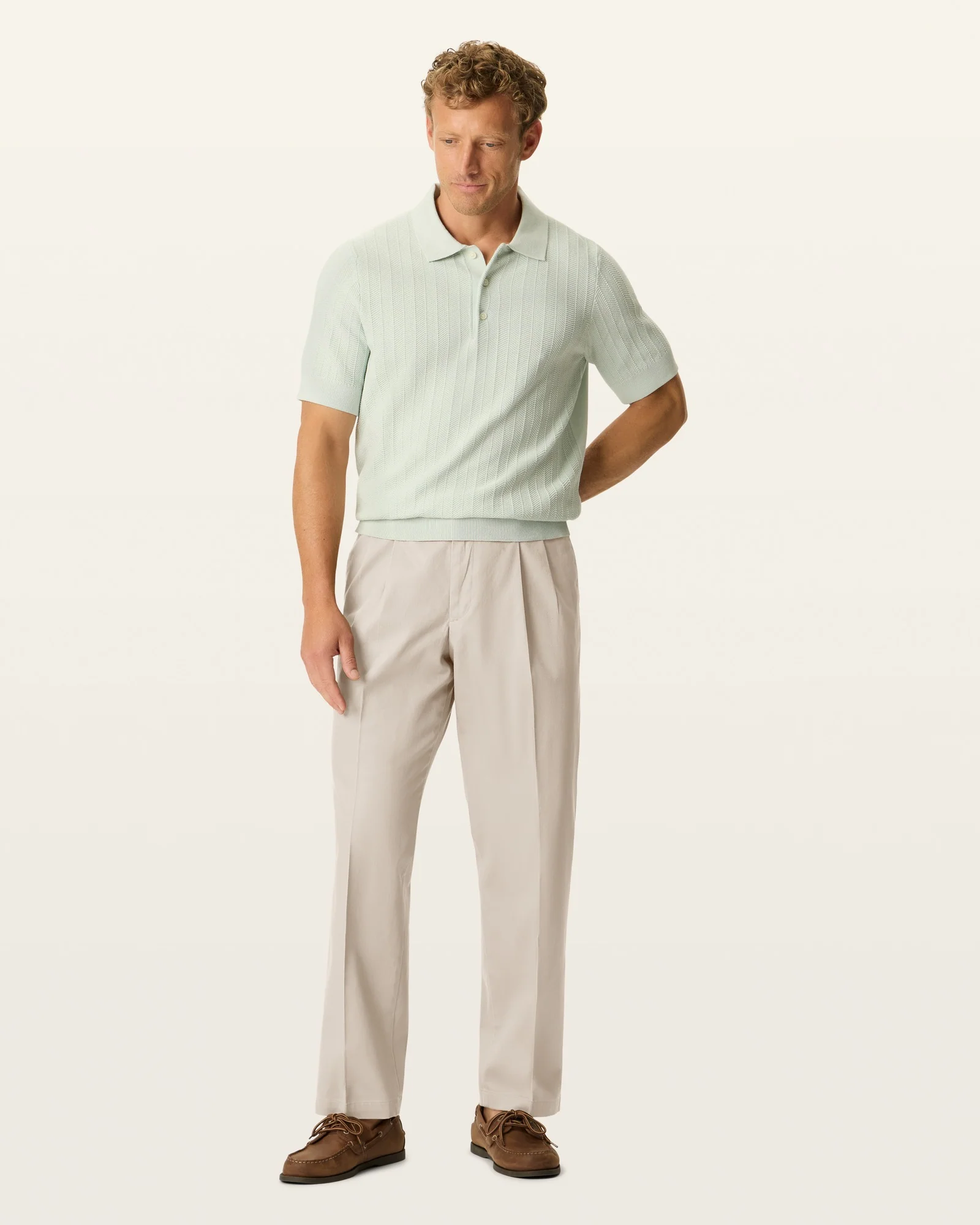 Signature Iron Free Khakis. Pleated. Classic Fit with Stain Defender®